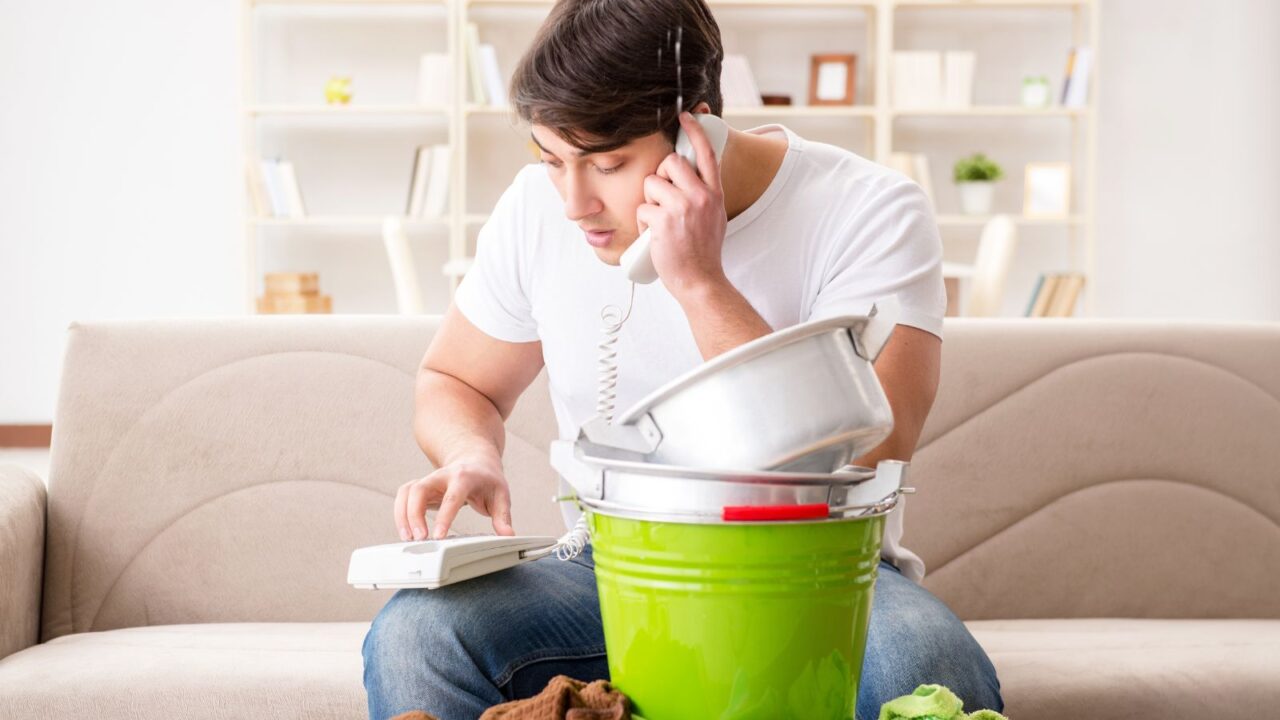 Man with Leak Calling Water Damage Mitigation Service in Houston