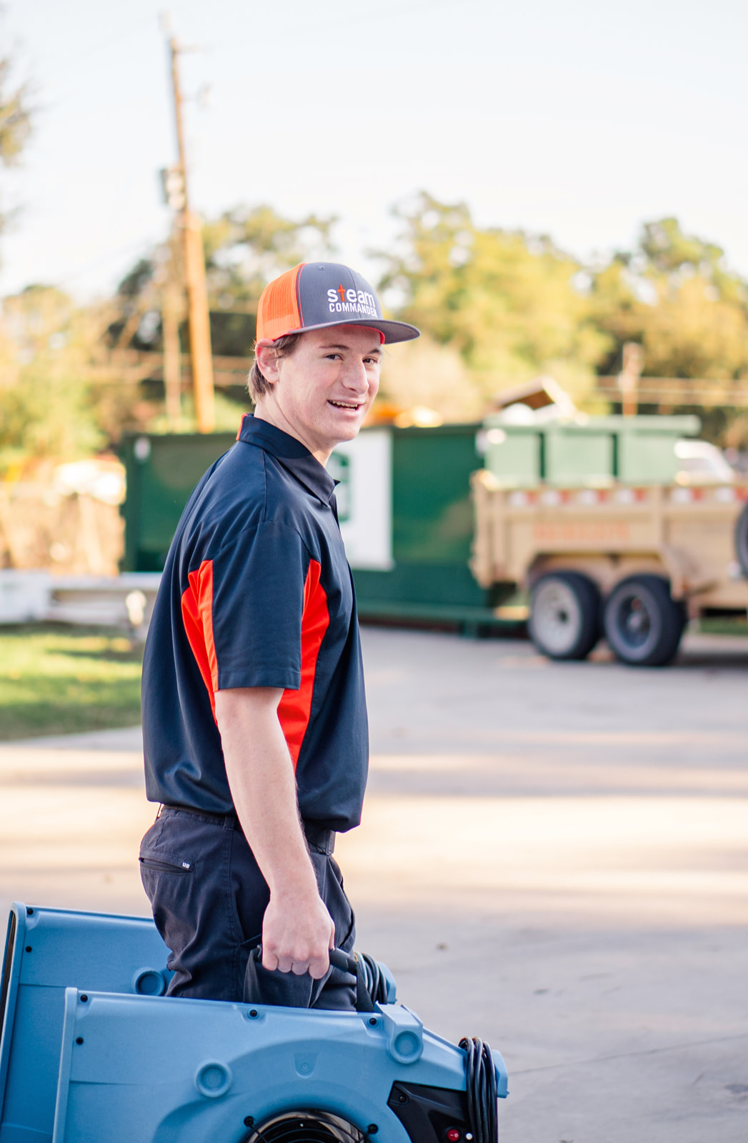 Steam Commander carrying equipment to Water Mitigation Job Steam Commander carrying equipment to Water Mitigation Job