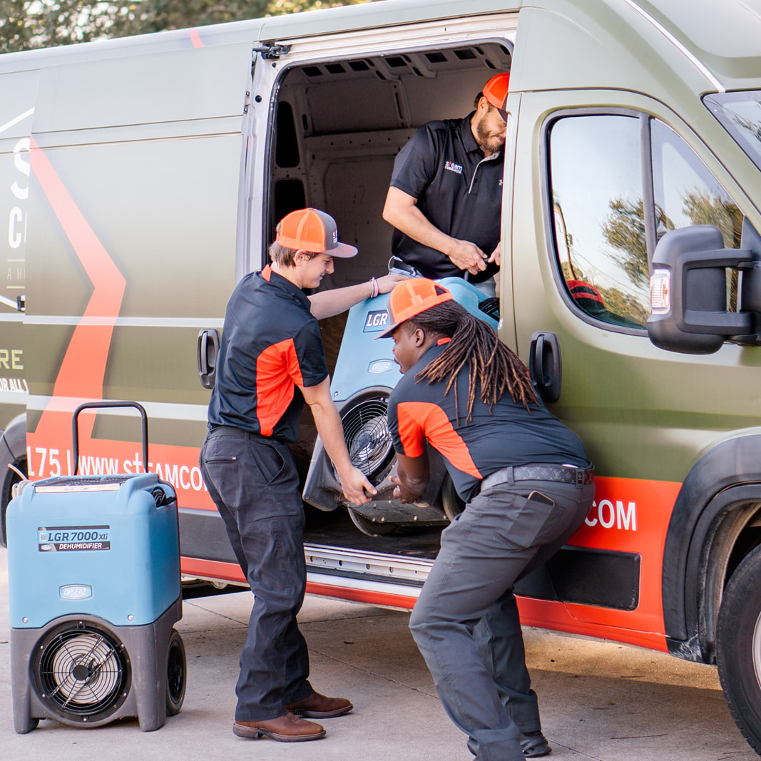 Steam Commander water mitigation team getting equipment Steam Commander water mitigation team getting equipment