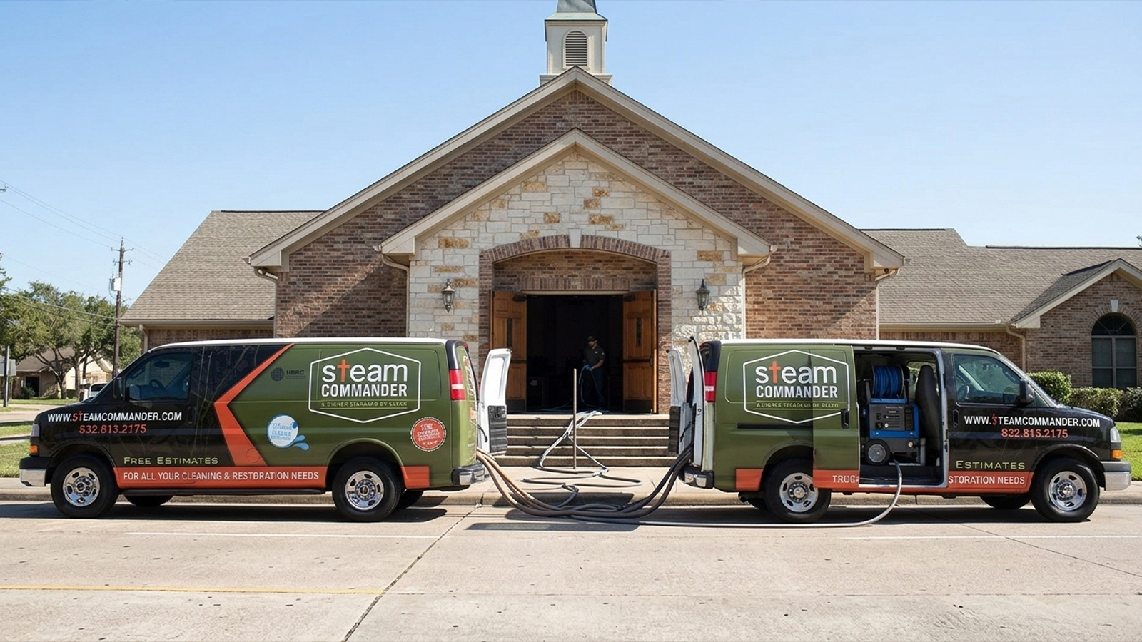 Steam Commander vans in front of a church in Houston